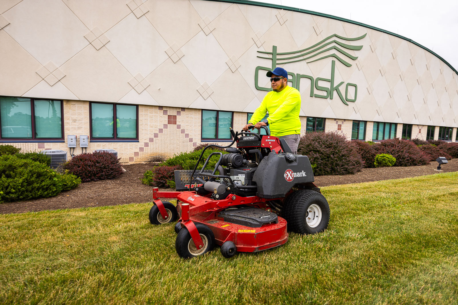 Pickel Landscape Group crew member mowing a commercial property in Chester County