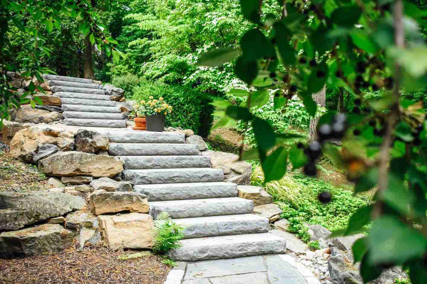Stone steps with well-maintained garden — winter landscape care in Chester County