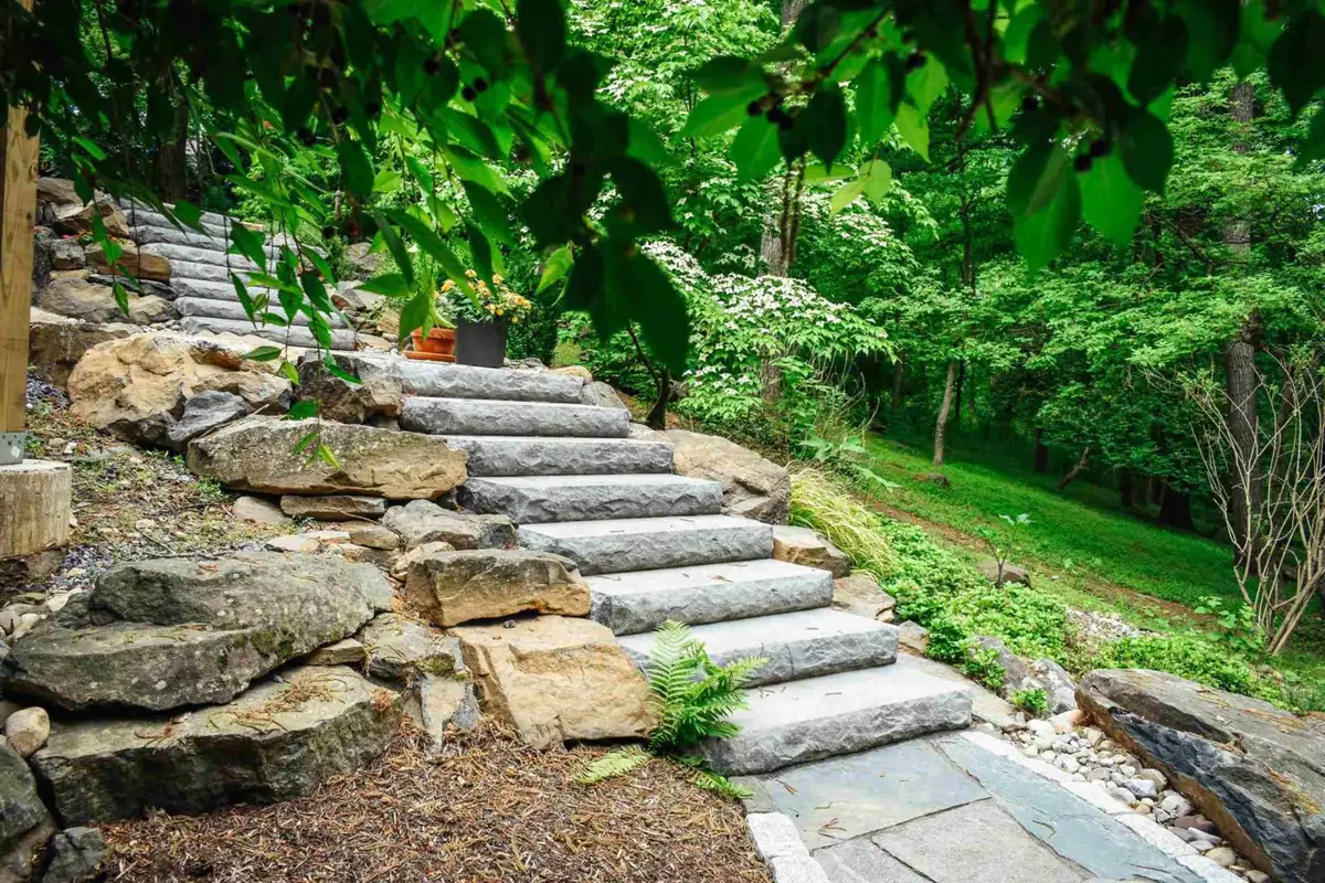 Boulder steps with deck and water feature