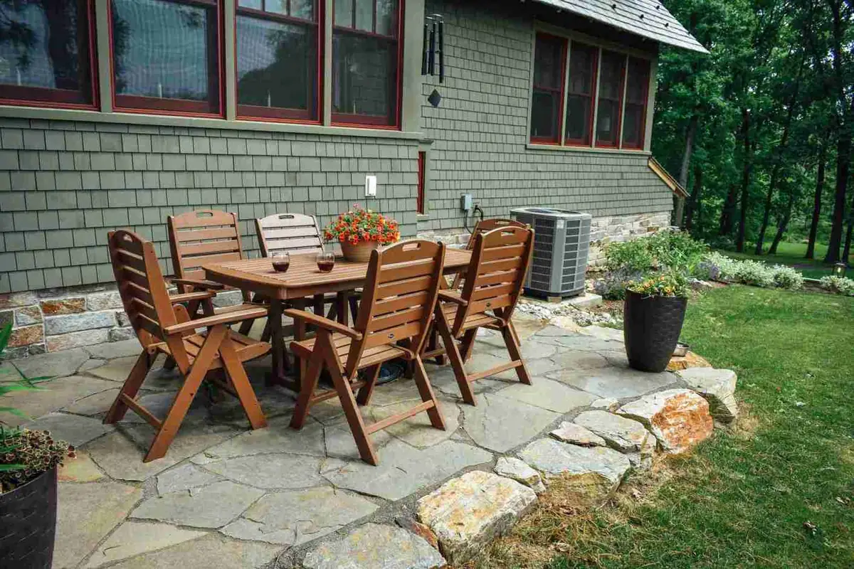 Deck with patio furniture and garden