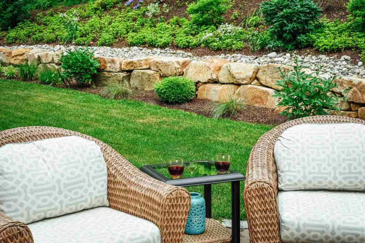 Wicker patio furniture on flagstone