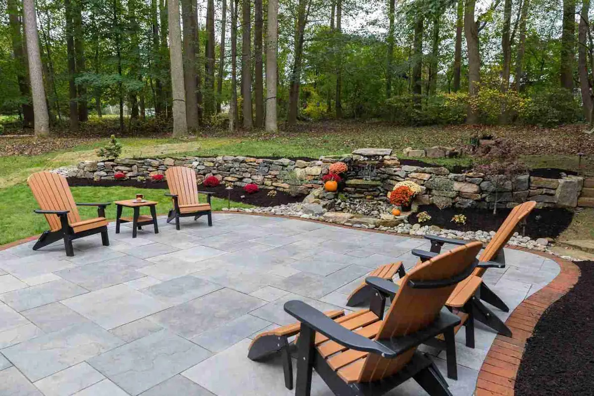 Paver patio with Adirondack chairs